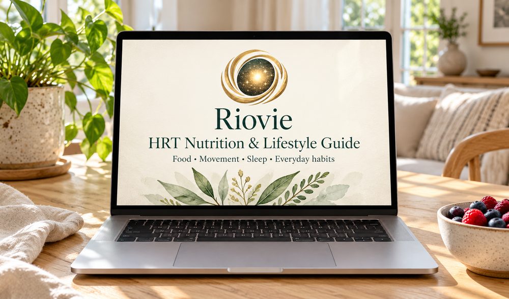 Riovie Hormone Health Guide open on a laptop beside a bowl of berries